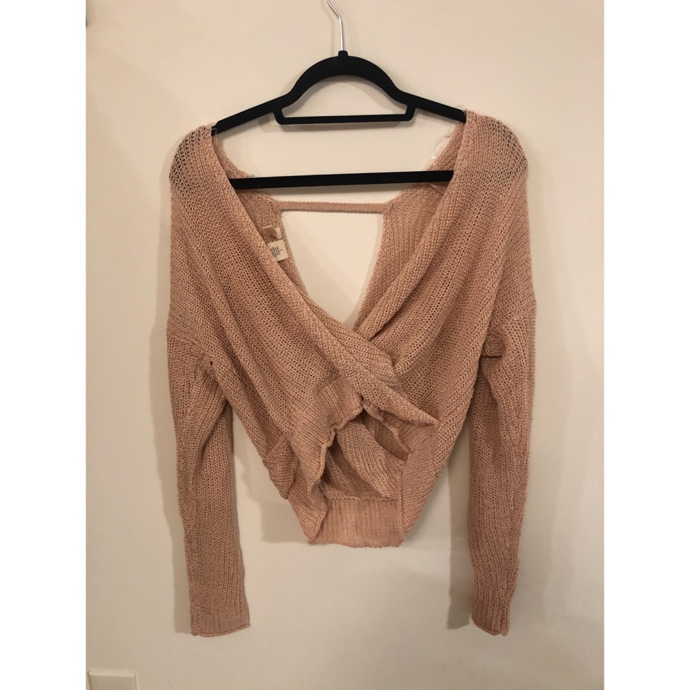Pink drapey criss cross neck sweater.